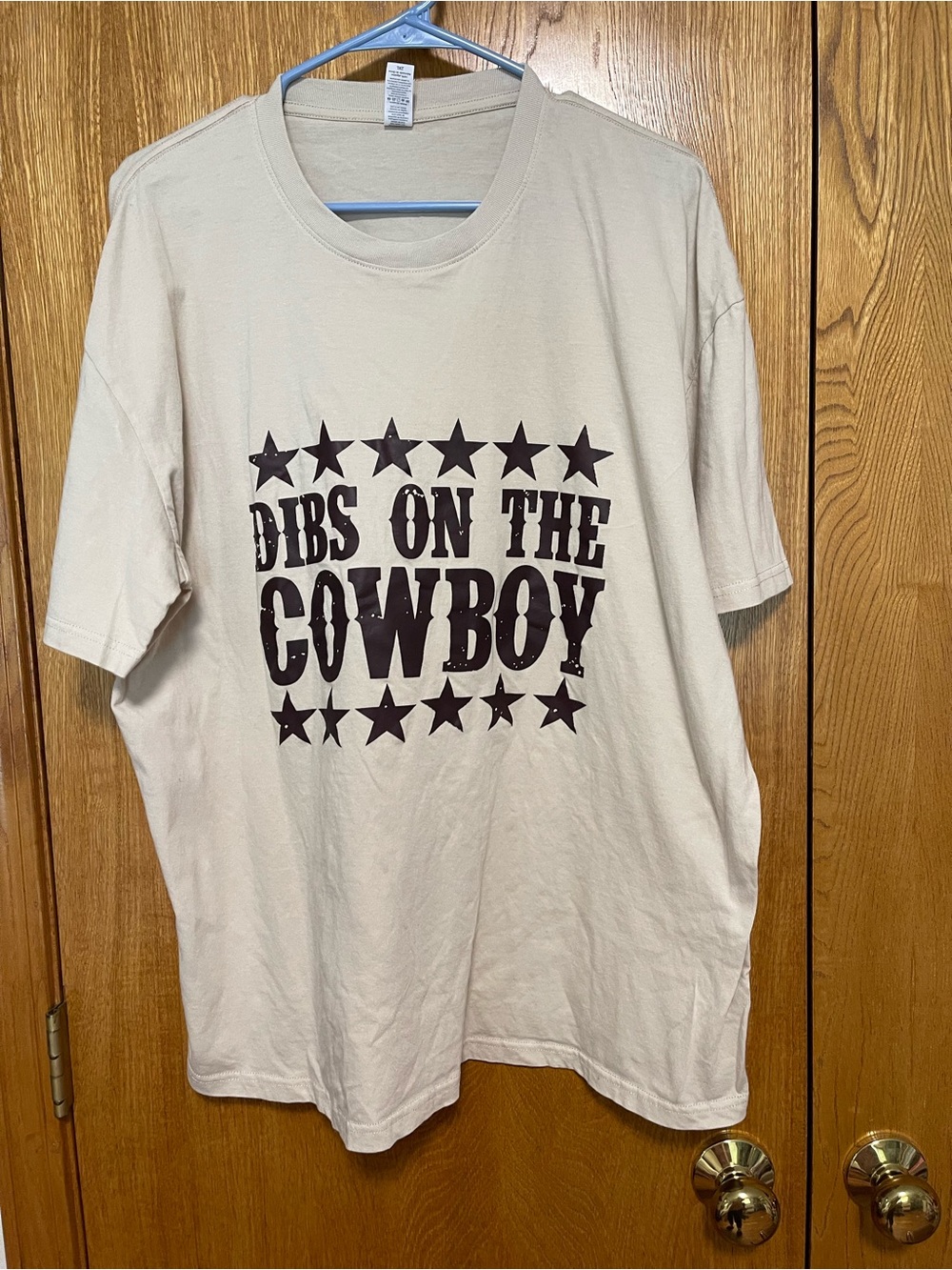 Women’s Dibs on the Cowboy' Cream Graphic Tee